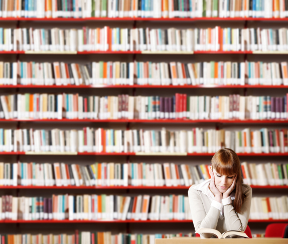 Young student in a library