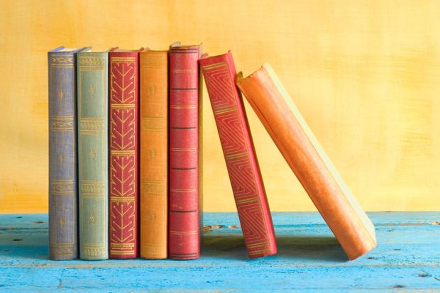 row-of-books-stacked-side-by-side