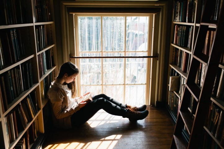 young-woman-reading-book