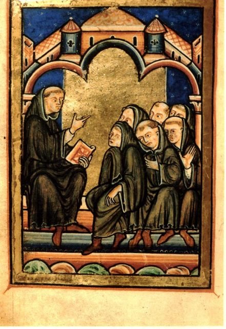 cuthbert-teaching-with-a-book-in-his-hand-ch-16-life-of-cuthbert-441x640-1